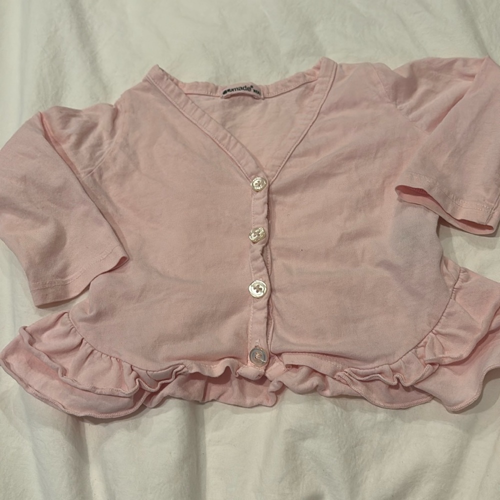 Pink ruffled cardigan